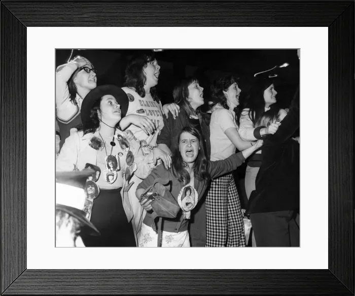 Framed Print : Screaming fans at an Osmonds concert during their British tour. 26th May 1975 Framed Print : Screaming fans at an Osmonds concert during their British tour. 26th May 1975