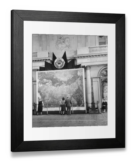 Framed Print : A couple of tourist look at a map of the Soviet empire on display in the Hermitage Framed Print : A couple of tourist look at a map of the Soviet empire on display in the Hermitage