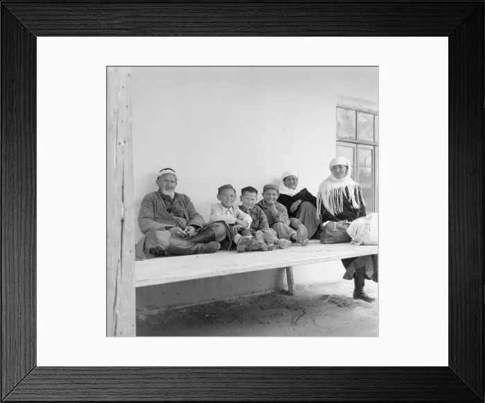 Framed Print : A typical Uzbeki family dressed in traditional costume pose for the Daily Mirror Framed Print : A typical Uzbeki family dressed in traditional costume pose for the Daily Mirror