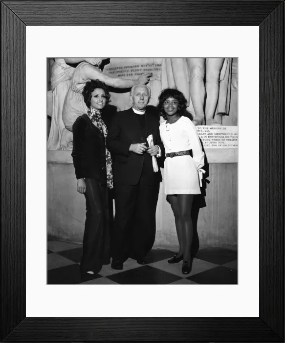 Framed Print : Dean of St Pauls Cathedral Reverend Martin Sullivan with Go Go dancer Sandie Framed Print : Dean of St Pauls Cathedral Reverend Martin Sullivan with Go Go dancer Sandie