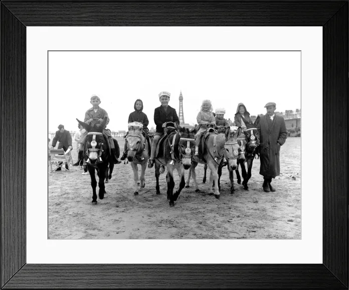 Framed Print : Children riding donkeys along the beach at Blackpool 5th August 1958