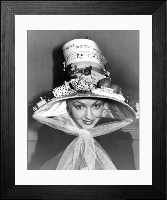 Framed Print : Jacky Harris is seen wearing an Easter bonnet by part time student Miss P