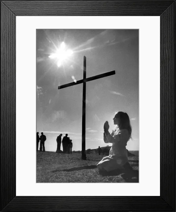 Framed Print : Audrea Thompson prays by the cross mounted on Tunstall Hill, Sunderland in 1980 Framed Print : Audrea Thompson prays by the cross mounted on Tunstall Hill, Sunderland in 1980