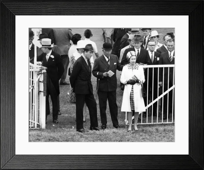 Framed Print : Queen Elizabeth II accompanied by the Duke of Norfolk watching the parade of Oaks runners Framed Print : Queen Elizabeth II accompanied by the Duke of Norfolk watching the parade of Oaks runners