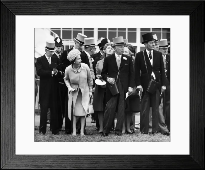Framed Print : Queen Elizabeth II takes a close look at the parade of the Oaks runners at Epsom with