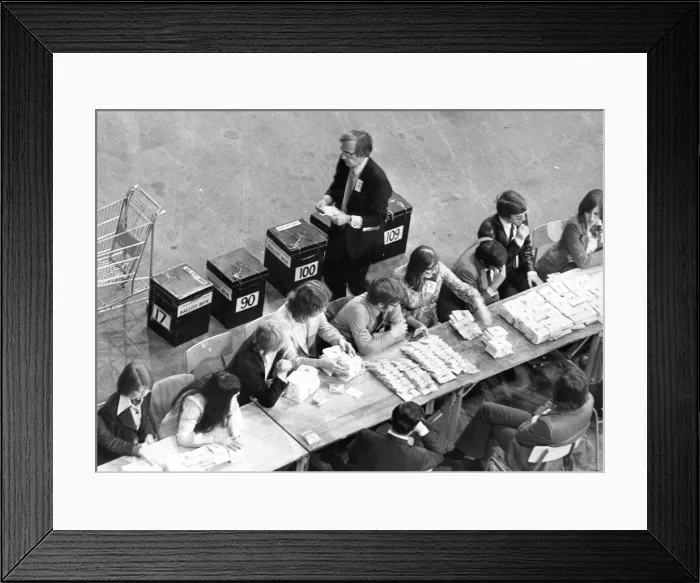 Framed Print : Votes already counted and stacked into neat bundles on one of the counting tables Framed Print : Votes already counted and stacked into neat bundles on one of the counting tables