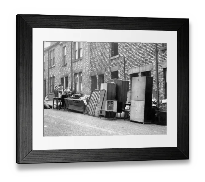 Framed Print : Mrs. McGeorges furniture stands outside her home in John Street Framed Print : Mrs. McGeorges furniture stands outside her home in John Street