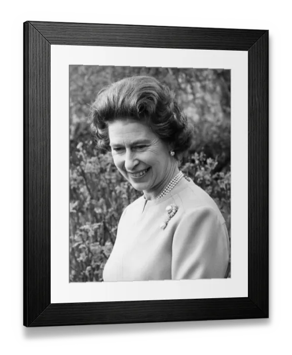 Framed Print : Queen Elizabeth II smiles in the grounds of Windsor Castle during a photocalll to mark Framed Print : Queen Elizabeth II smiles in the grounds of Windsor Castle during a photocalll to mark