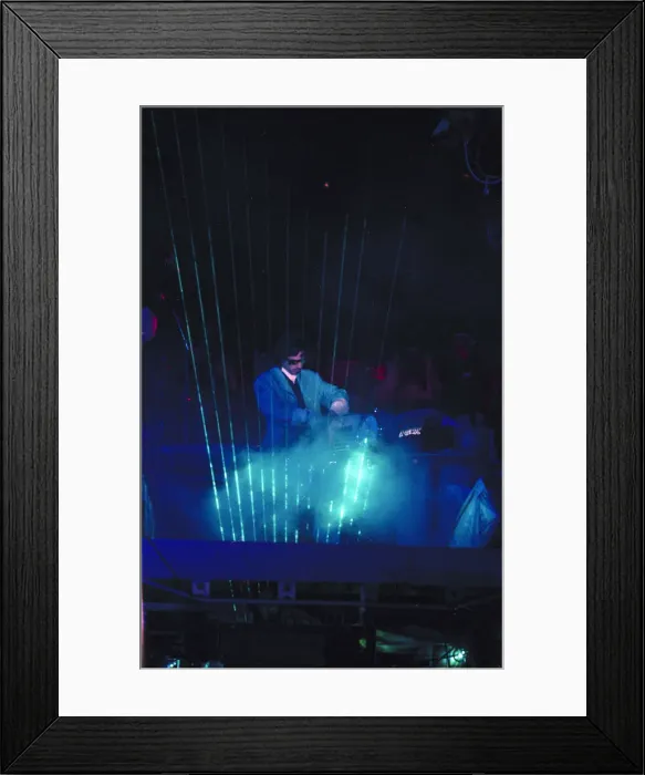 Framed Print : French composer and performer Jean Michel Jarre seen here on stage playing a laser harp