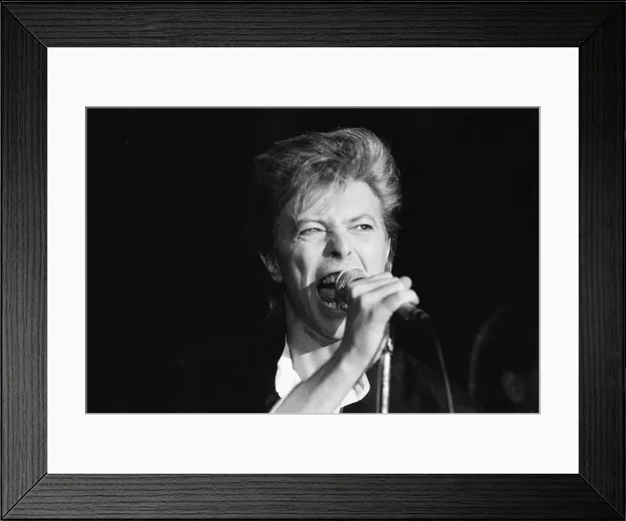 Framed Print : David Bowie seen here singing at the press conference to announce the details of his Framed Print : David Bowie seen here singing at the press conference to announce the details of his