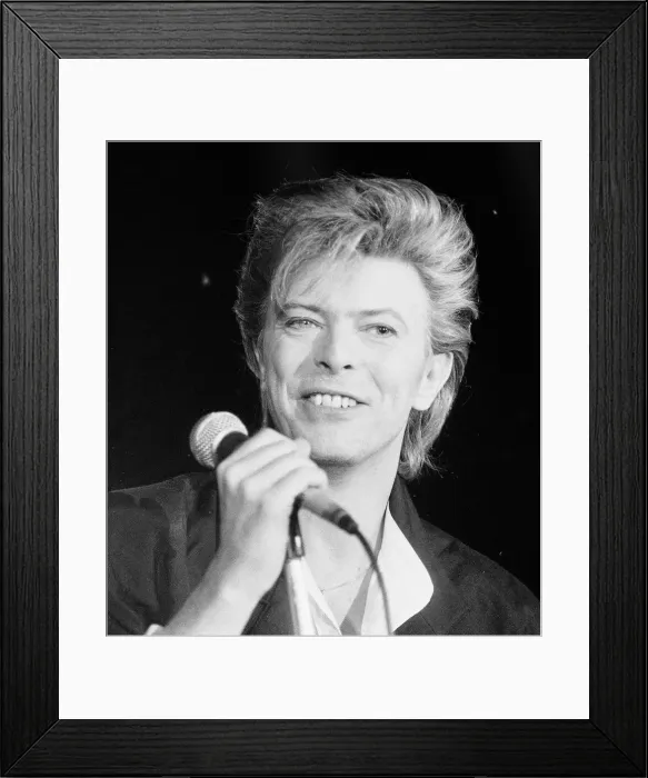 Framed Print : David Bowie seen here singing at the press conference to announce the details of his Framed Print : David Bowie seen here singing at the press conference to announce the details of his