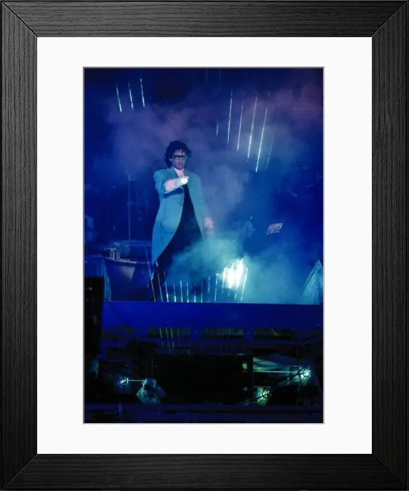 Framed Print : French composer and performer Jean Michel Jarre seen here on stage playing a laser harp Framed Print : French composer and performer Jean Michel Jarre seen here on stage playing a laser harp
