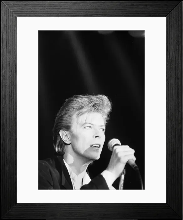 Framed Print : David Bowie seen here singing at the press conference to announce the details of his Framed Print : David Bowie seen here singing at the press conference to announce the details of his