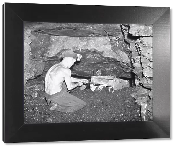 Coal miners working at the coal face in the Somerset coalfields, March 1946 OP403B