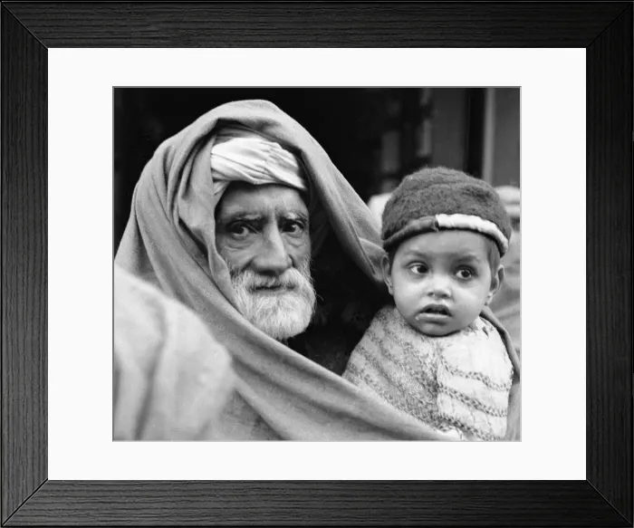Framed Print : A grandfather and his grandson seen here on the streets of Peshawar the capital of Framed Print : A grandfather and his grandson seen here on the streets of Peshawar the capital of