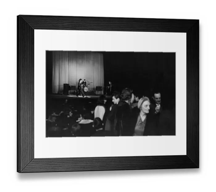 Framed Print : Some older patrons look disgruntled during the Beatles
