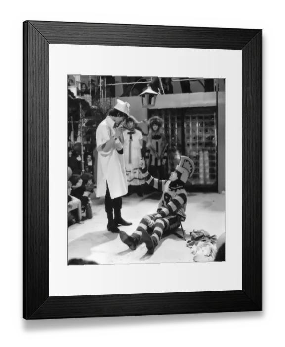 Framed Print : George Harrison and Paul McCartney rehearse for the Around the Beatles television