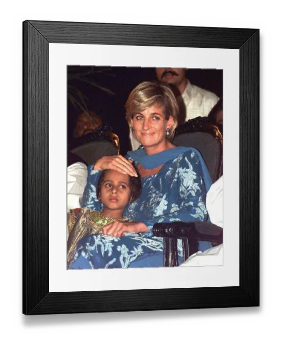 Framed Print : Diana, Princess of Wales, sits with a young girl at a fund raising event at the Shaukat Framed Print : Diana, Princess of Wales, sits with a young girl at a fund raising event at the Shaukat