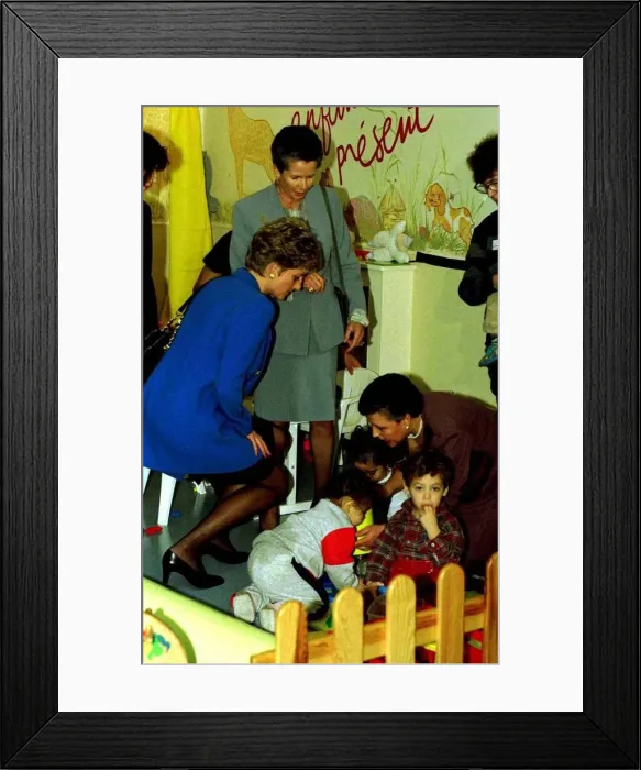 Framed Print : Diana Princess of Wales visits the Enfant Present Creche in Paris during her one day