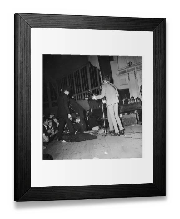 Framed Print : Beatles files 1963 Police go on stage during Beatles concert in Derbyshire after