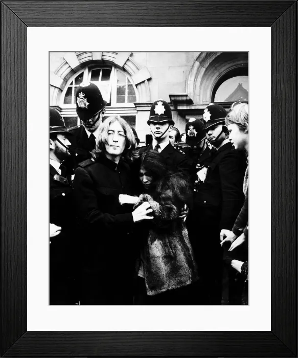 Framed Print : John Lennon Beatles Singer with wife Yoko Ono surrounded by police