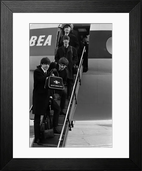 Framed Print : The Beatles - Pop Group - February 1964 The Beatles arrive back in London Framed Print : The Beatles - Pop Group - February 1964 The Beatles arrive back in London