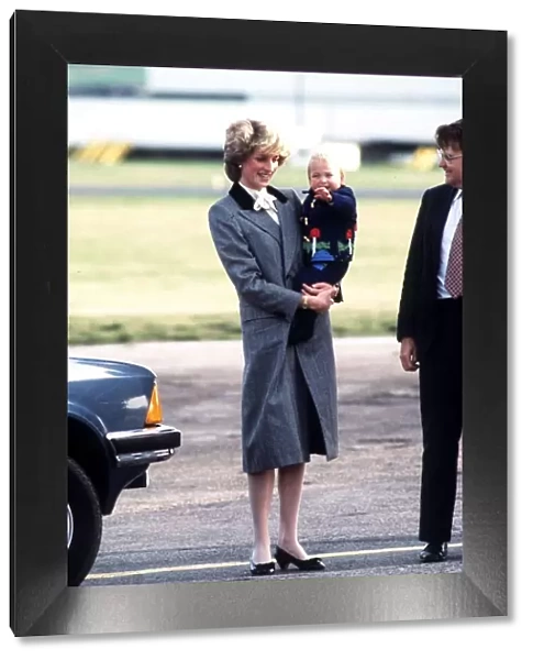 Princess Diana with her baby son Prince William at Aberdeen airport