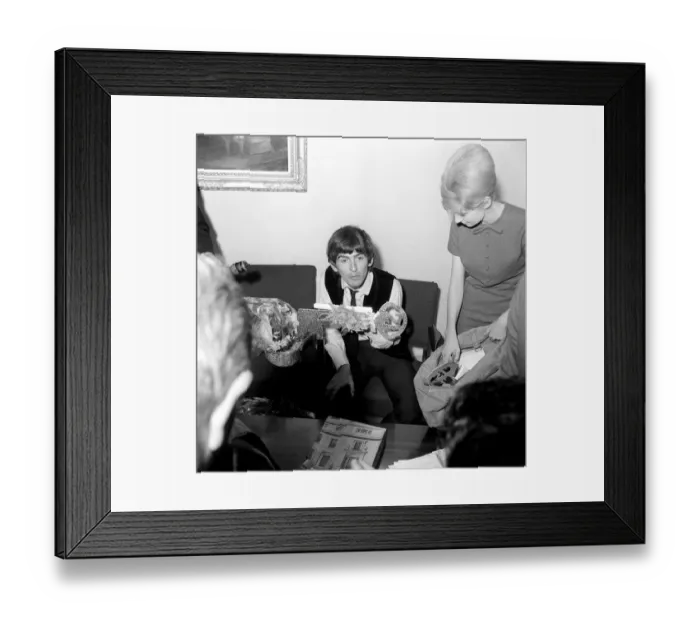 Framed Print : George Harrison, 21st birthday, with fan-club secretary helping him sort through the 52