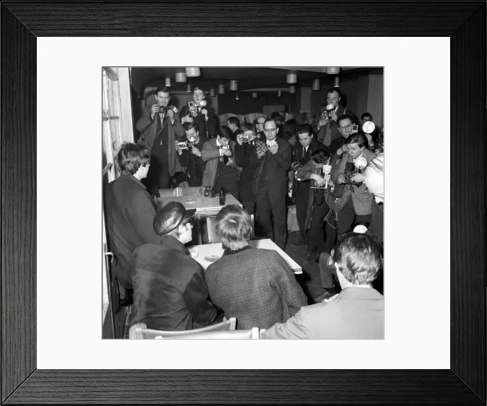 Framed Print : Beatles left to right: Paul McCartney, John Lennon and George Harrison at a press