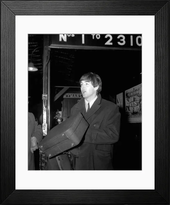 Framed Print : Paul McCartney at Paddington Station about to board the train for the filmining for