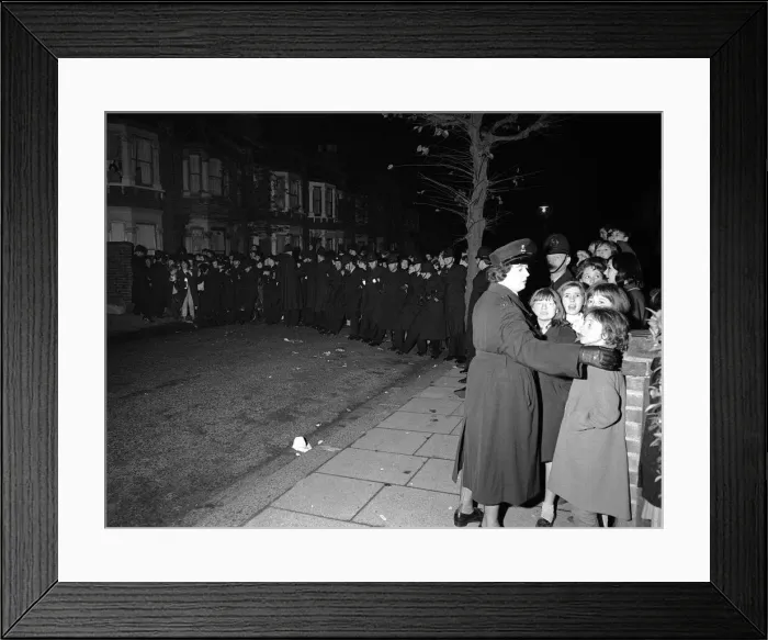Framed Print : The Beatles Autumn Tour of Great Britain. Police hold back the screaming Beatles