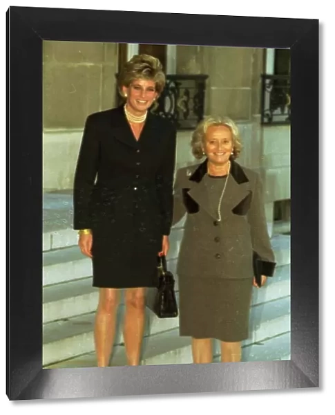 Princess Diana standing beside Madame Bernadette Chirac on the steps of the Elysee