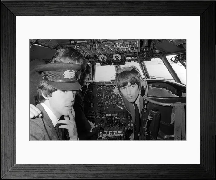 Framed Print : Paul McCartney, George Harrison and Ringo Starr in the cockpit on the plane bound for