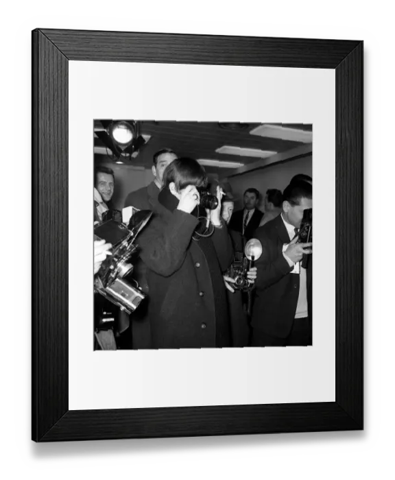Framed Print : The Beatles Leaving for New York. Ringo Starr taking pictures of Paul McCartney along Framed Print : The Beatles Leaving for New York. Ringo Starr taking pictures of Paul McCartney along