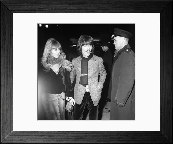 Framed Print : George Harrison and his wife Patti arriving for the film premiere of Framed Print : George Harrison and his wife Patti arriving for the film premiere of