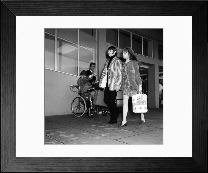 Framed Print : Beatles drummer Ringo Starr and wife Maureen at Heathrow Airport before leaving for a two