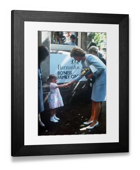 Framed Print : Princess Diana pictured with nursery school children during a visit to the Barnardo