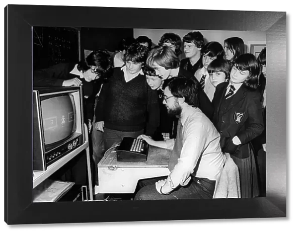Children using computers. The mother of one of the pupils at Benfield Road School