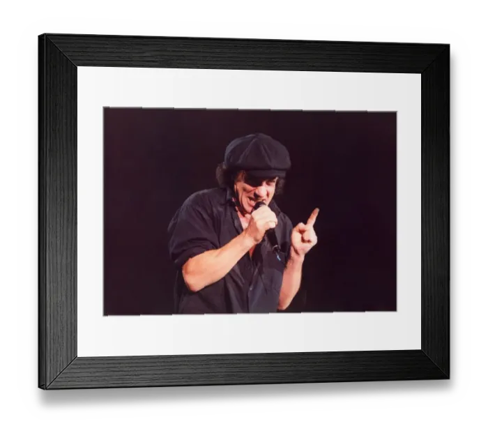 Framed Print : Brian Johnson lead singer of the rock group AC / DC at the Newcastle Arena. 05 / 06 / 96 Framed Print : Brian Johnson lead singer of the rock group AC / DC at the Newcastle Arena. 05 / 06 / 96