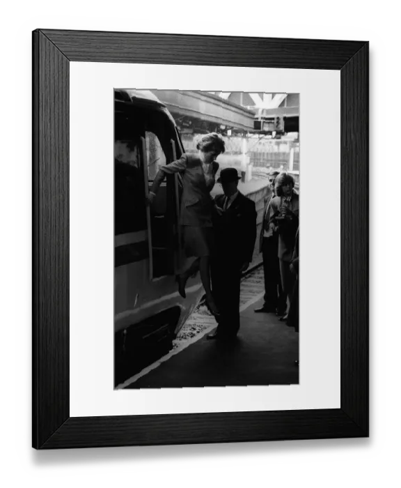 Framed Print : Diana, Princess of Wales jumps off a train at Paddington Station, London Framed Print : Diana, Princess of Wales jumps off a train at Paddington Station, London
