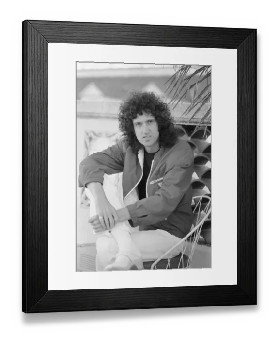 Framed Print : Queen guitarist Brian May seen here relaxing in a roof top garden in New Orleans, USA Framed Print : Queen guitarist Brian May seen here relaxing in a roof top garden in New Orleans, USA