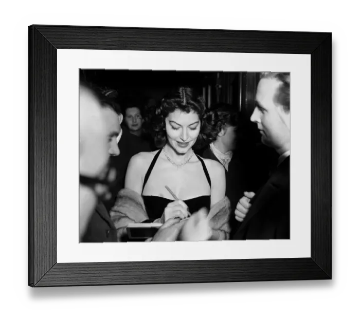 Framed Print : Film actress Ava Gardner signing autographs at a Midnight Matinee at the Colliseum Framed Print : Film actress Ava Gardner signing autographs at a Midnight Matinee at the Colliseum