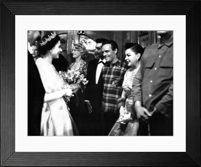 Framed Print : Queen Elizabeth II has a happy smile as she congratulates Judy Gardland on her Framed Print : Queen Elizabeth II has a happy smile as she congratulates Judy Gardland on her