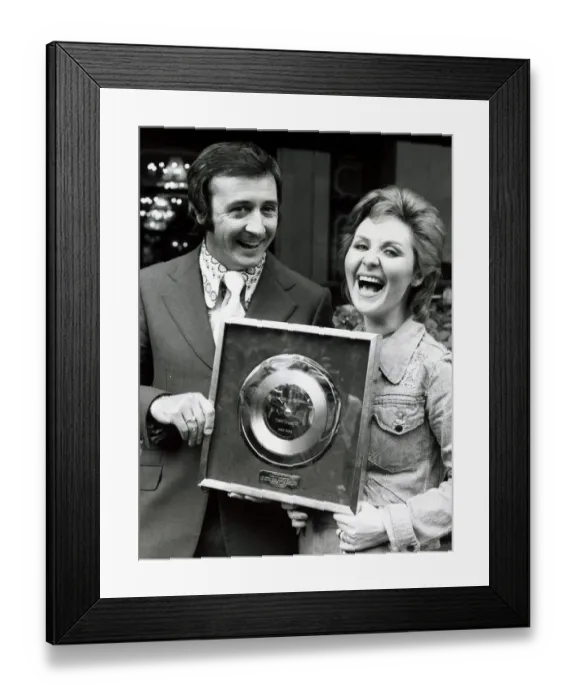 Framed Print : Singer Tony Christie with pop singer Lulu wins award for a million sales of his hit Is
