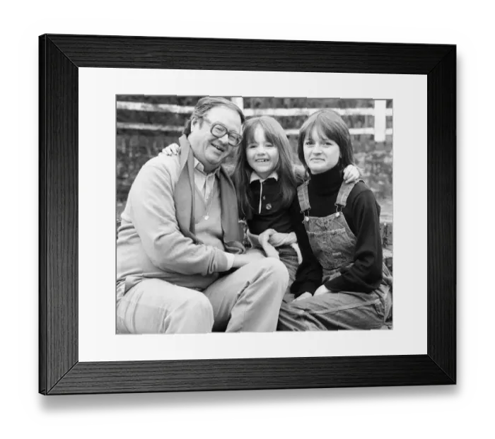 Framed Print : John Mortimer QC with his wife Penny and seven year old daughter Emily at their home in