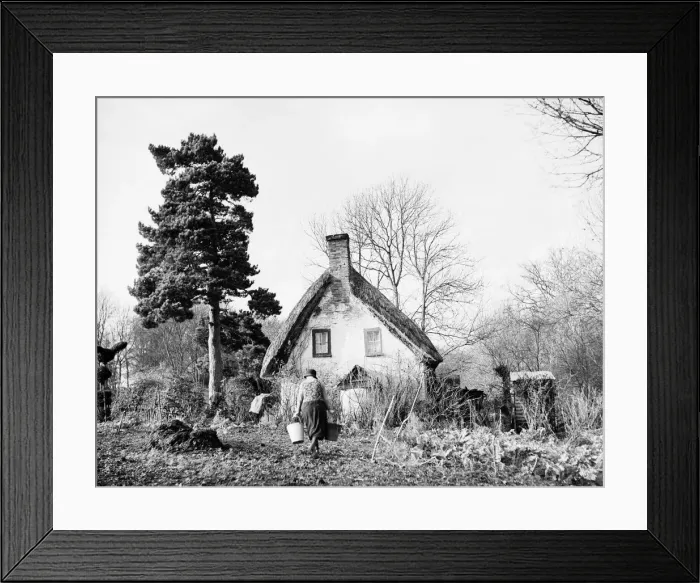 Framed Print : Women carrying buckets of water to her rural cottage, far from the world