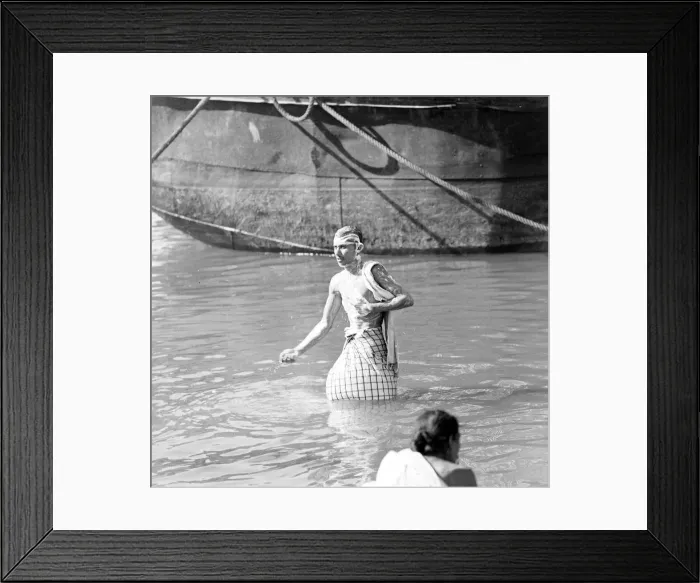 Framed Print : Locals bath in the Buriganga River Dacca, Bangladesh. February 1961 l Framed Print : Locals bath in the Buriganga River Dacca, Bangladesh. February 1961 l