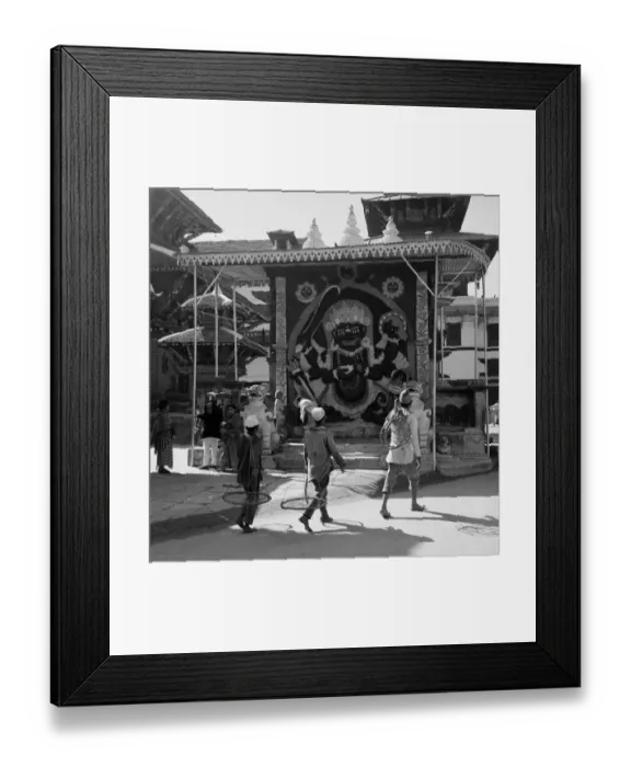 Framed Print : Street traders pass the entrance to the Pashupatinath Temple Kathmandu Nepal Framed Print : Street traders pass the entrance to the Pashupatinath Temple Kathmandu Nepal