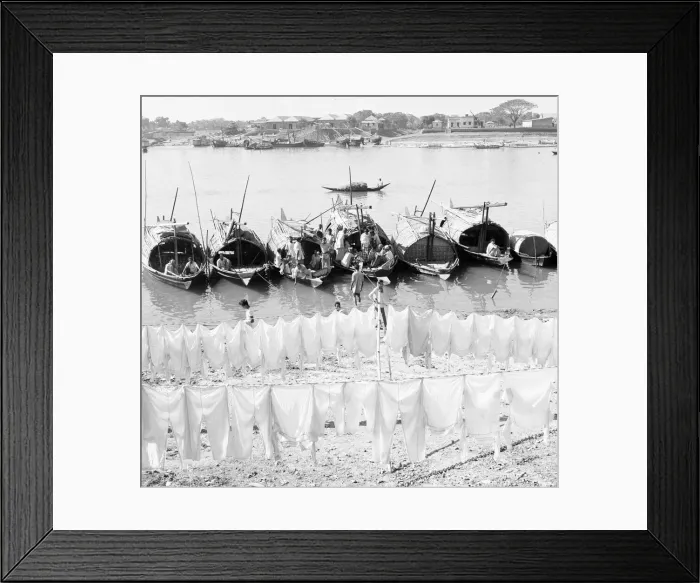 Framed Print : Boat people seen here hanging their washing out to dry on the muddy beach in Dacca Framed Print : Boat people seen here hanging their washing out to dry on the muddy beach in Dacca