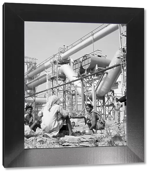 Woman seen here making tea for the workers at the Durgapur steel works in West Bengal